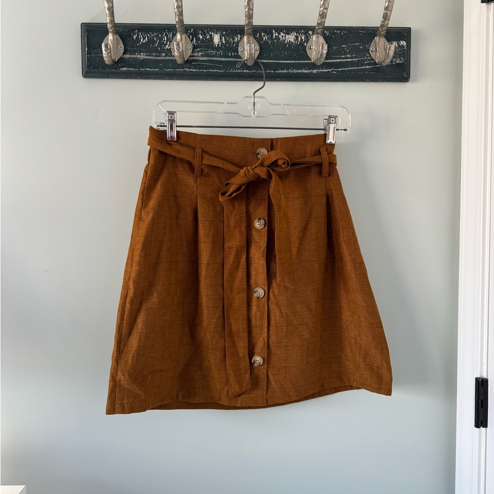 have brown skirt
